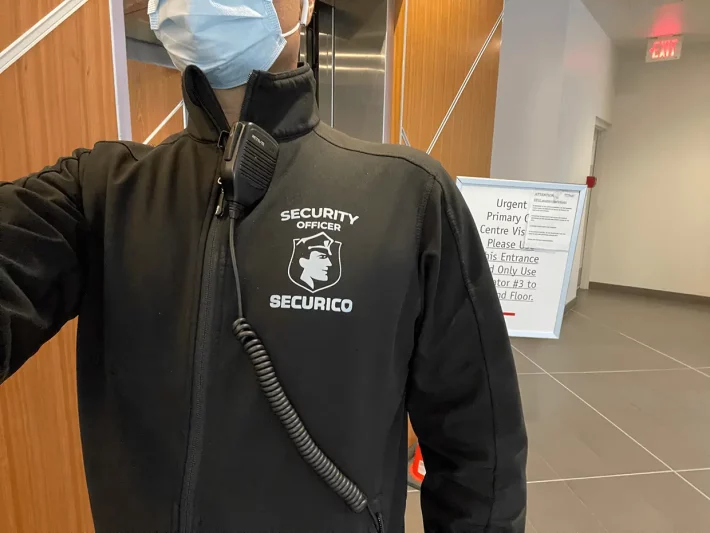 Vancouver security guard wearing PPE